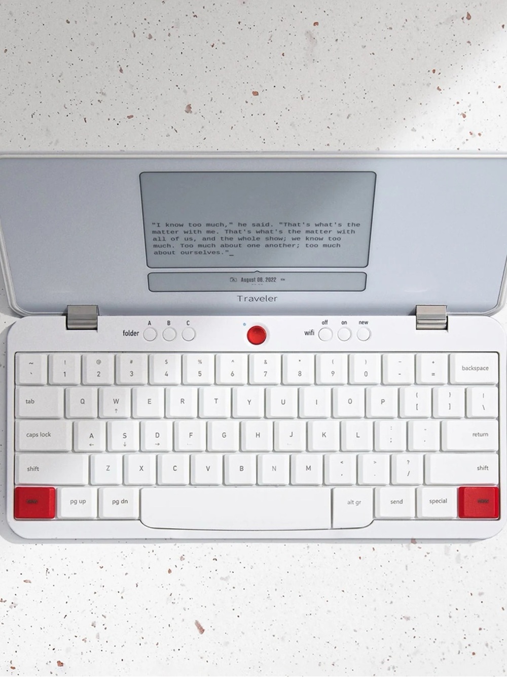 Freewrite Traveler White Keyboard with Red Accent Keys and E-Ink Display.